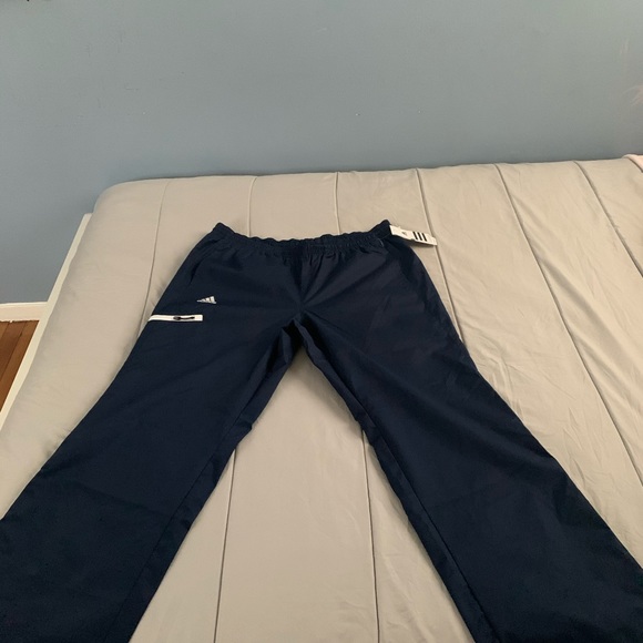 WOMENS ADIDAS CLIMAPROOF®️ Wind PANTS NAVY BLUE - Picture 3 of 8